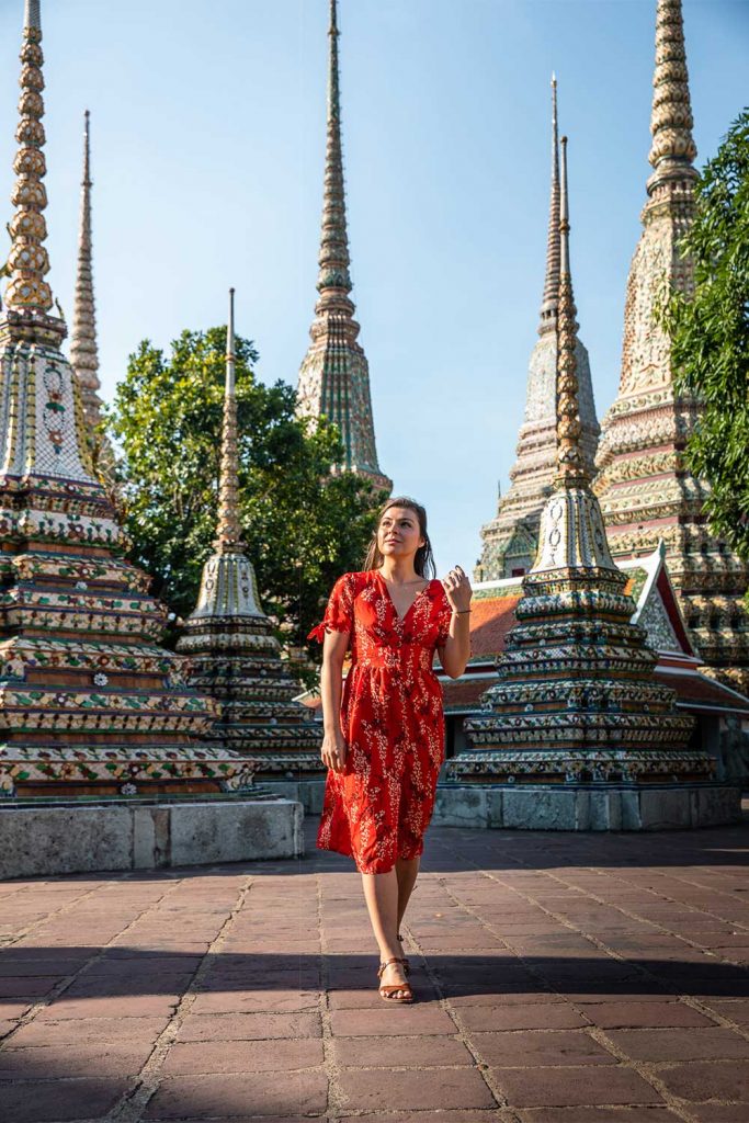 Melissa in front of the spires at Wat Pho Temple