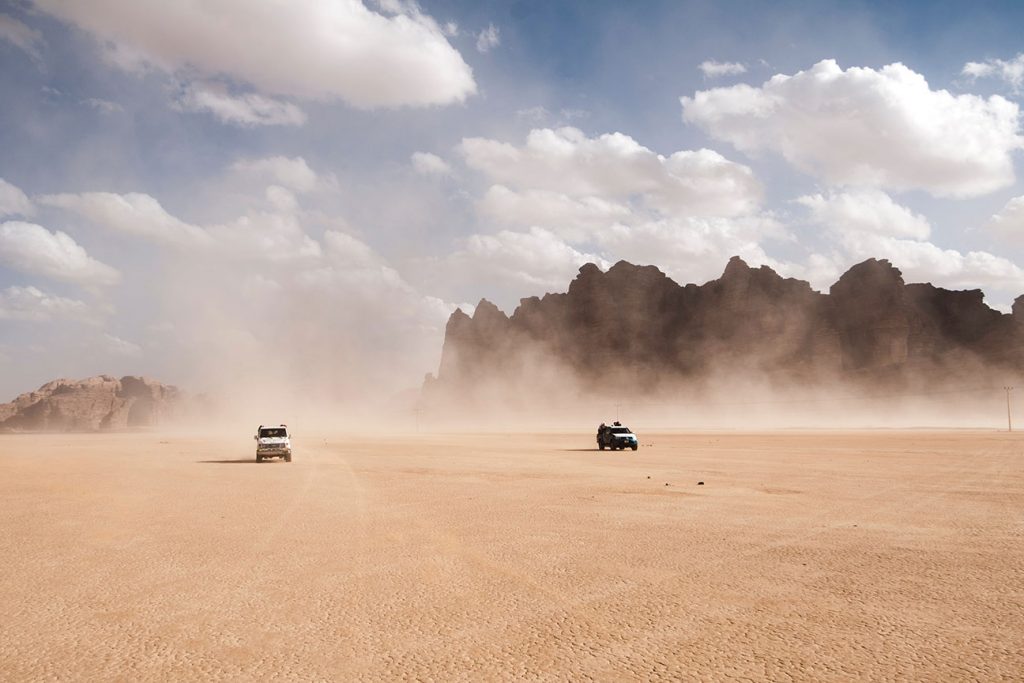 Cars driving through the wadi rum represent one of the best ways to go to the Wadi Rum Desert