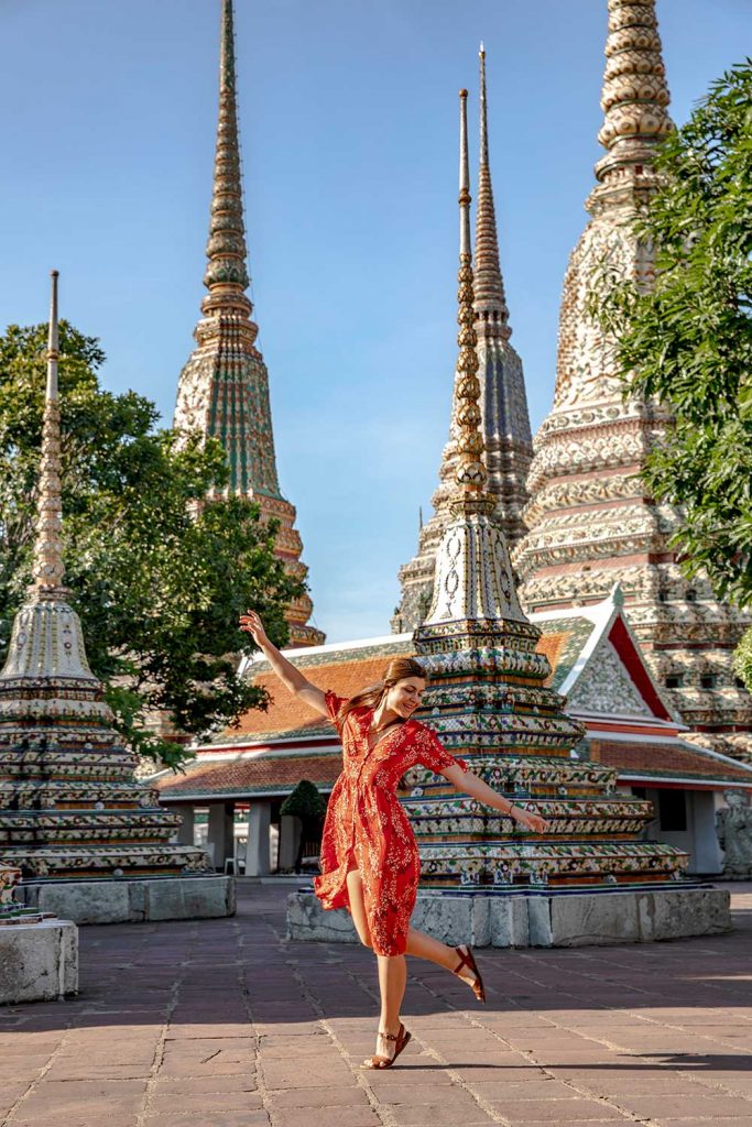 Melissa posing in the courtyard of Wat Pho Bangkok