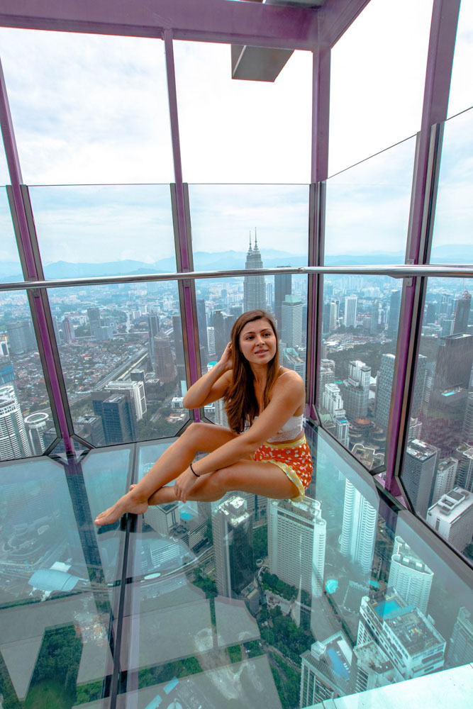 Melissa sitting in the Sky Box at the KL Tower in Kuala Lumpur